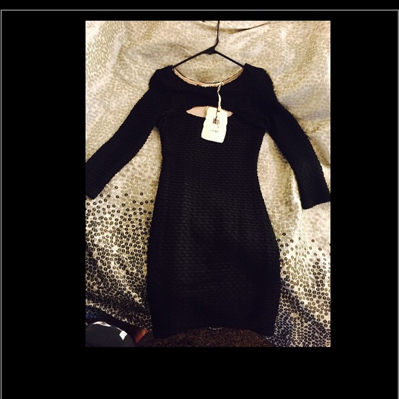 Black dress with tan showing through!!! NEVER WORN