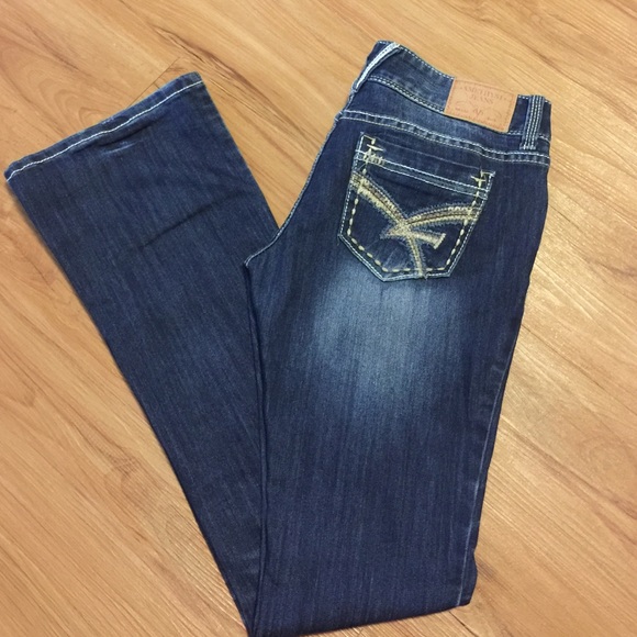 amethyst jeans with bejeweled buttons
