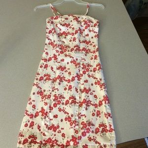 White mini dress with red flowers
