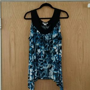 Blue top with flowers.