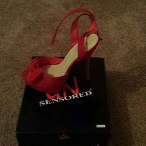 Never worn red heels