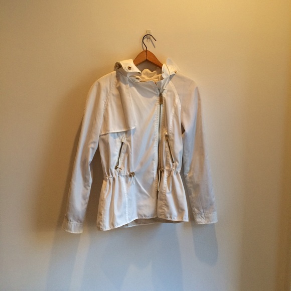 White windbreaker with gold details