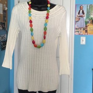 Crew neck ivory sweater.