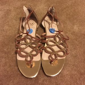 Tan and gold sandals