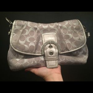 Silver coach purse. Great neutral color.