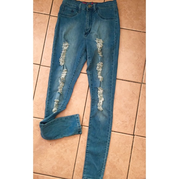 Tearing Zipper Fly Pocket Design Blue Jeans