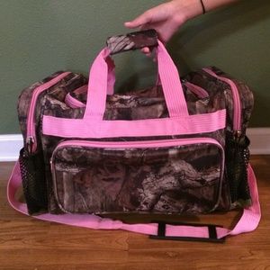 Camo and pink duffle bag