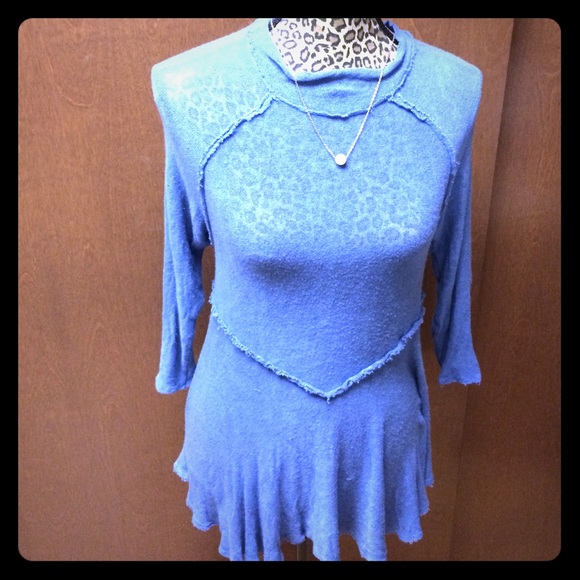 Free People - blue top with minor hole in front