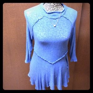 Free People - blue top with minor hole in front