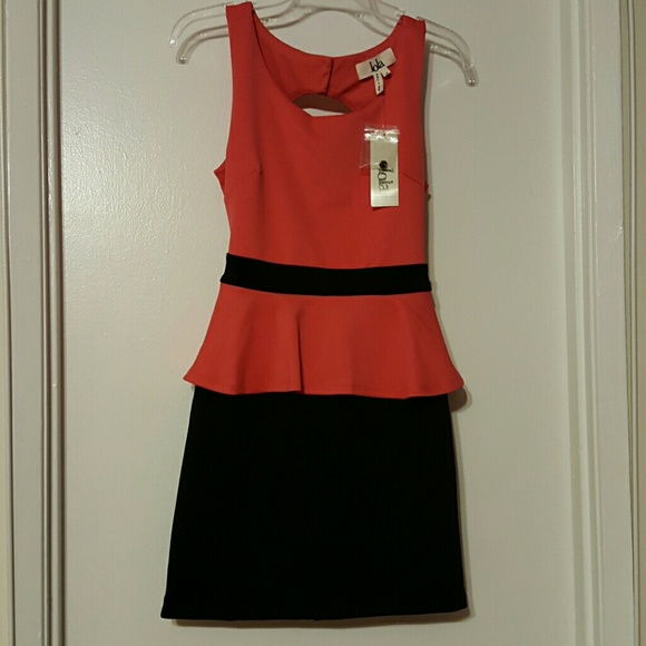 Lola Peplum open back dress