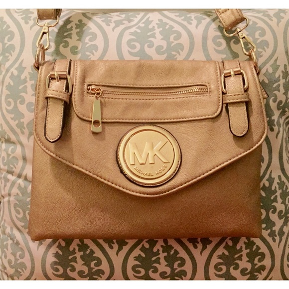 Michael Kors Gold across the shoulder purse