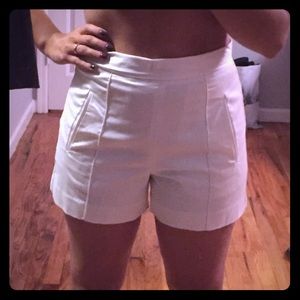 White pleated high waist shorts