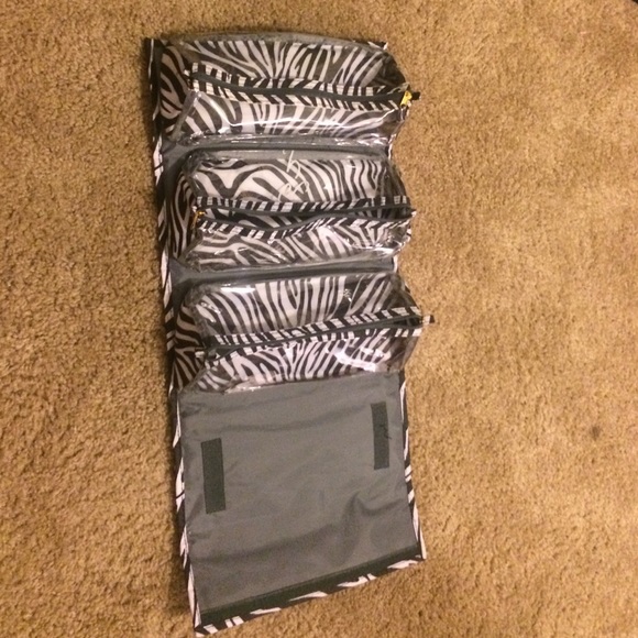 JM New York cosmetic carrying case.