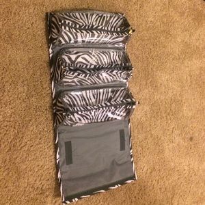 JM New York cosmetic carrying case.