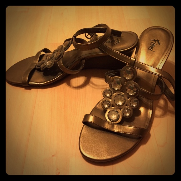 Jeweled strappy wedges.