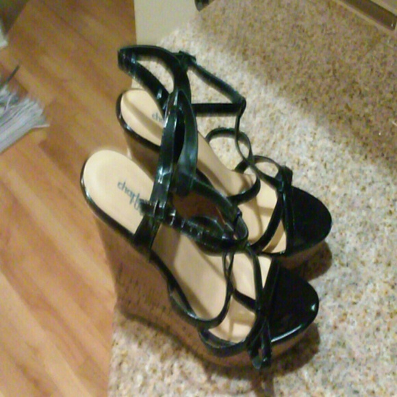 Black strapped wedge heels