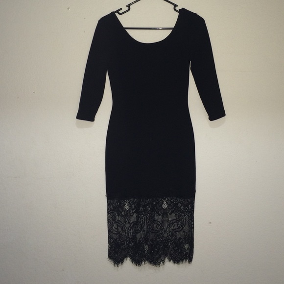 Tight black dress with lace bottom - Picture 1 of 4
