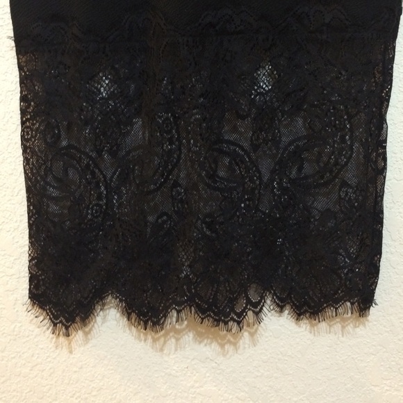 Tight black dress with lace bottom - Picture 2 of 4