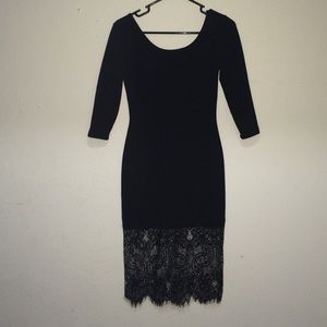 Tight black dress with lace bottom