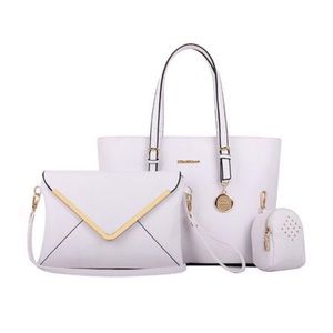 SOLD White 3 Piece Handbag Set