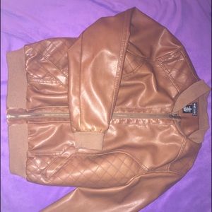 Fake leather jacket. Never worn. Like new.