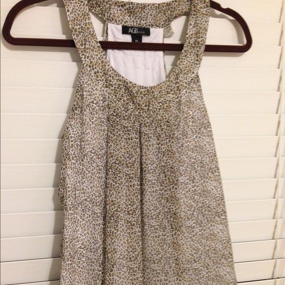 Pleated front//Ruffled back leopard print tanktop!