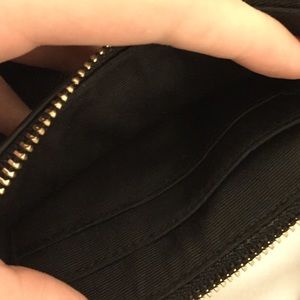 Coach clutch or wristlet.