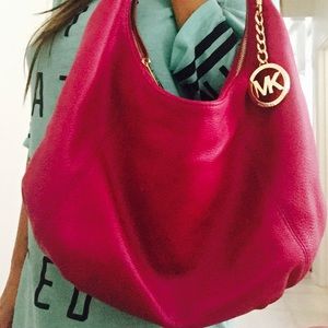 Michael Kors hobo magenta color handbag