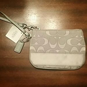 COACH wristlet. Brand new....never used