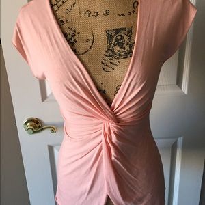 Bebe size small salmon color top