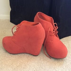 Orange suede-like booties size 6.5