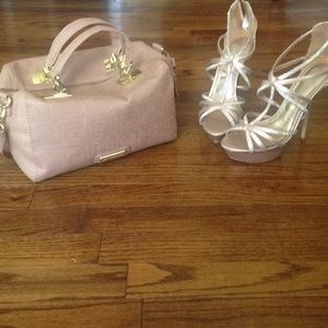 Steve Madden taupe colored purse.