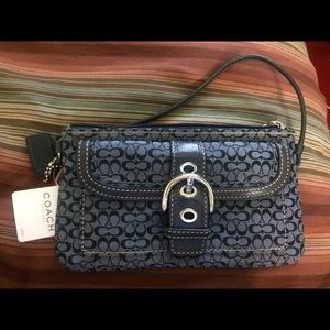 Authentic blue signature Coach wristlet