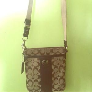 Classic brown patterned Coach swing back bag