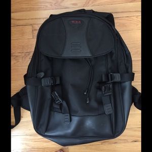 Tumi black backpack with padded lumbar support