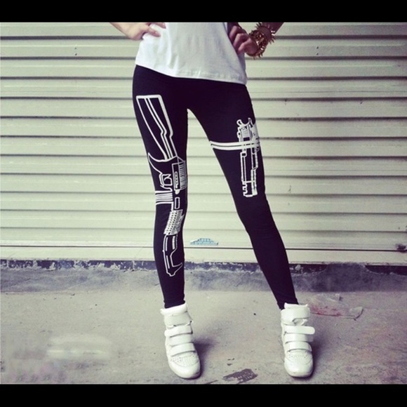 Gun strapped leggings.