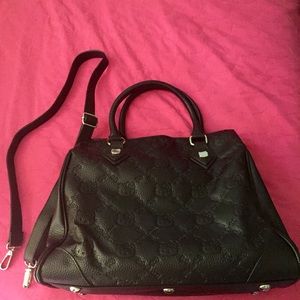 Black Bag with Hello Kitty on it.