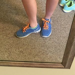 slightly worn Nike shoes