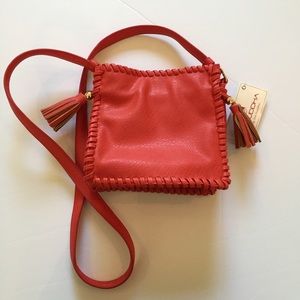 Mini red shoulder bag with tassels