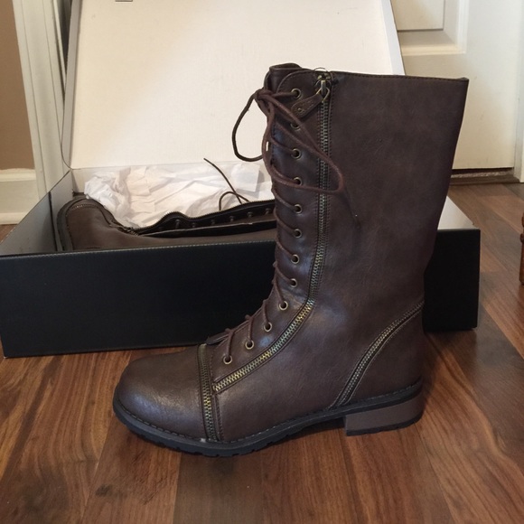 Brown combat boots with zipper detail