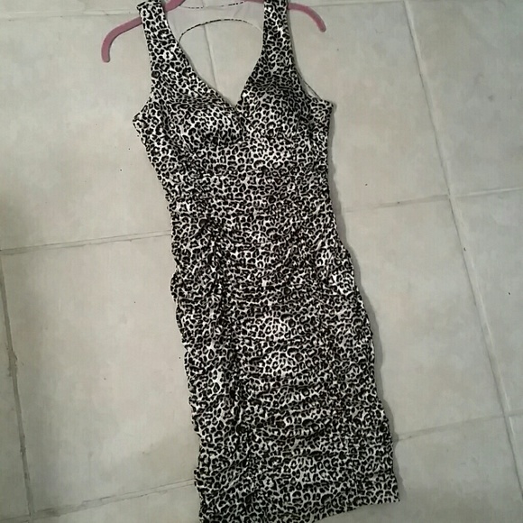 Coctai/party leopard dress.
