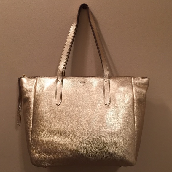 gold fossil purse