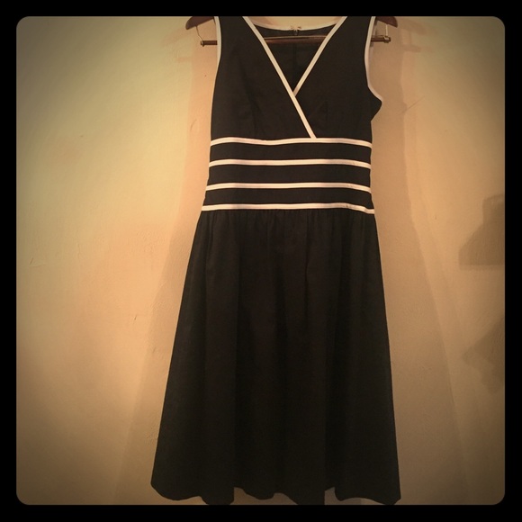 Liz Claiborne a-line with white piping.