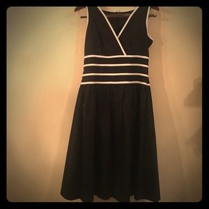 Liz Claiborne a-line with white piping.