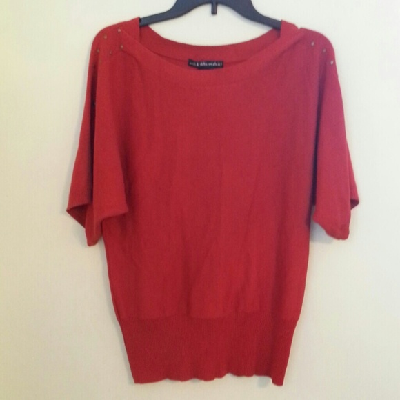 Terra Cotta Colored sweater.