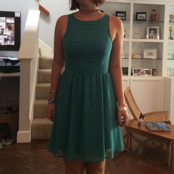 Green and white polkadots with key whole cut out.