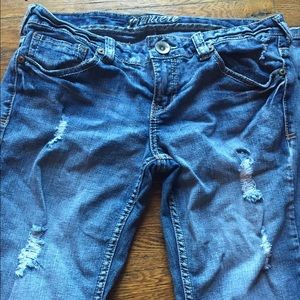 Distressed faded flare jeans