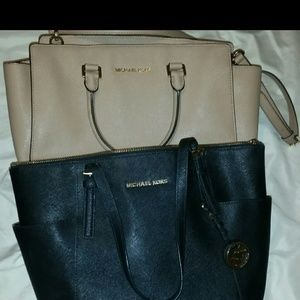Mk purses 300 for both