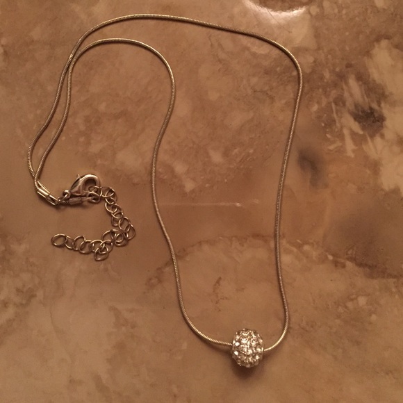 Necklace with sparkly pendant