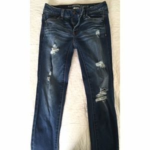 American eagle ripped blue jeans